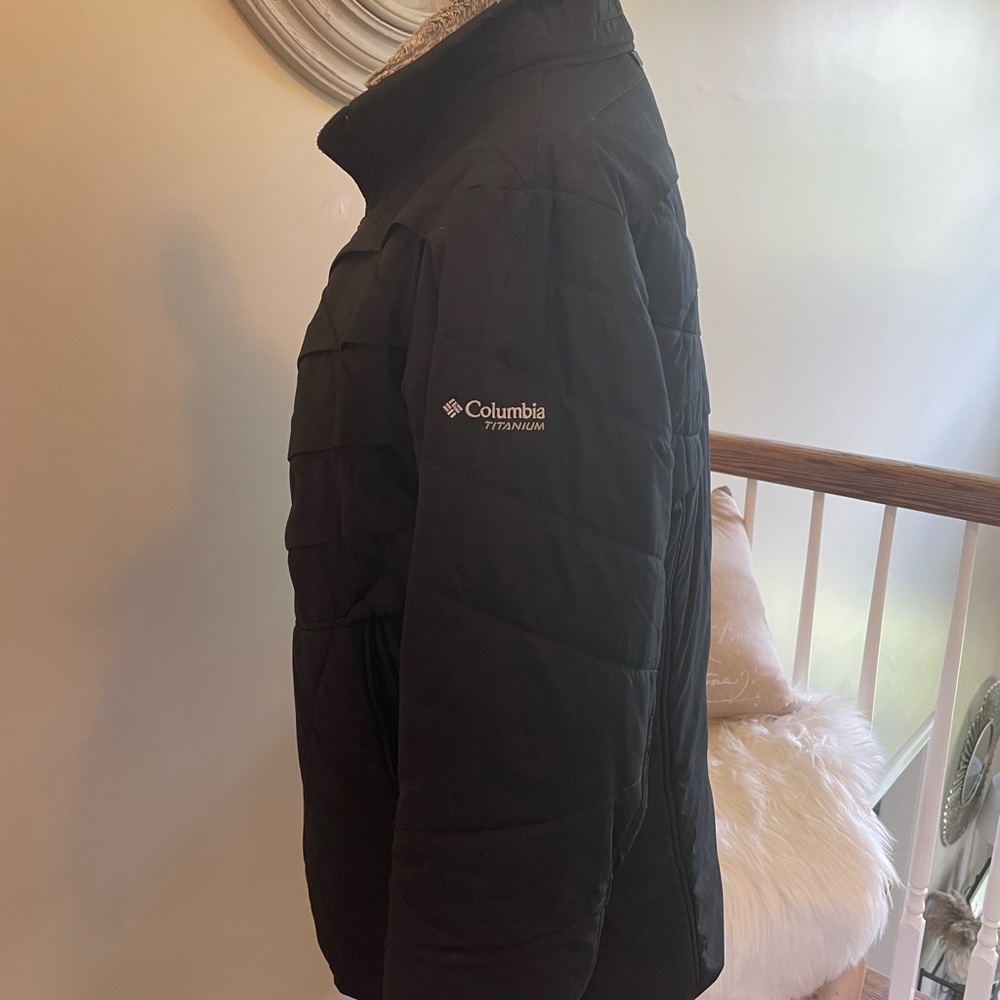 Black Columbia winter insulated jacket with faux fur collar.